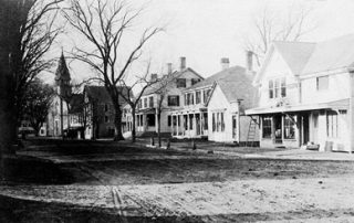 Photo taken circa 1905. From left to right: Unitarian church, Boyden Block and Central House (now gone), Nancy Fessenden House, Apothecary Shop, Thayer House